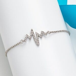 Silvertone Clear Swarovski Crystal Pave Heartbeat Bracelet